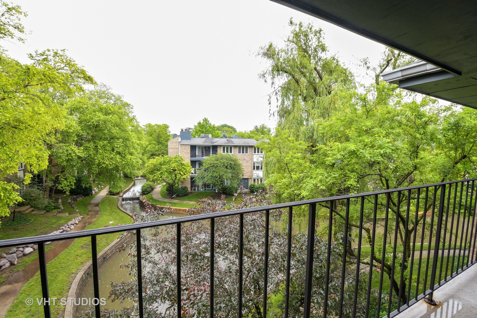 1979 Ammer Ridge Court, Unit 301 Glenview, IL 60025 - Photo 12 of 12 a view of a balcony with an outdoor space
