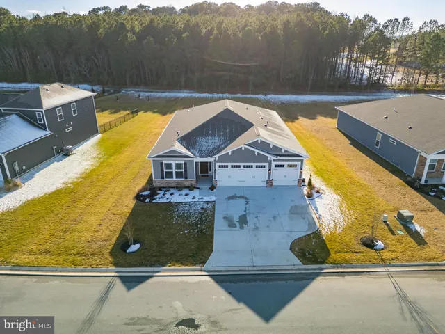 a view of a swimming pool with mountains in the background