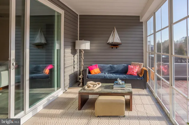 a view of a workspace with furniture