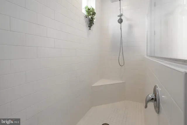 a view of a bedroom from a hallway