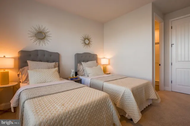 a view of swimming pool with seating space