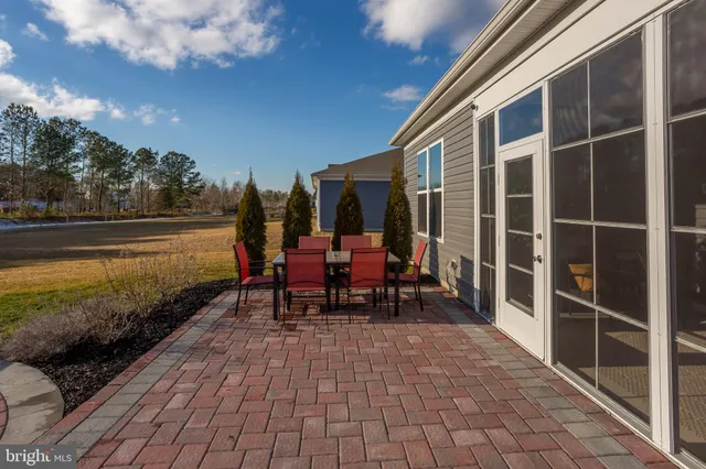 a view of a swimming pool with a yard