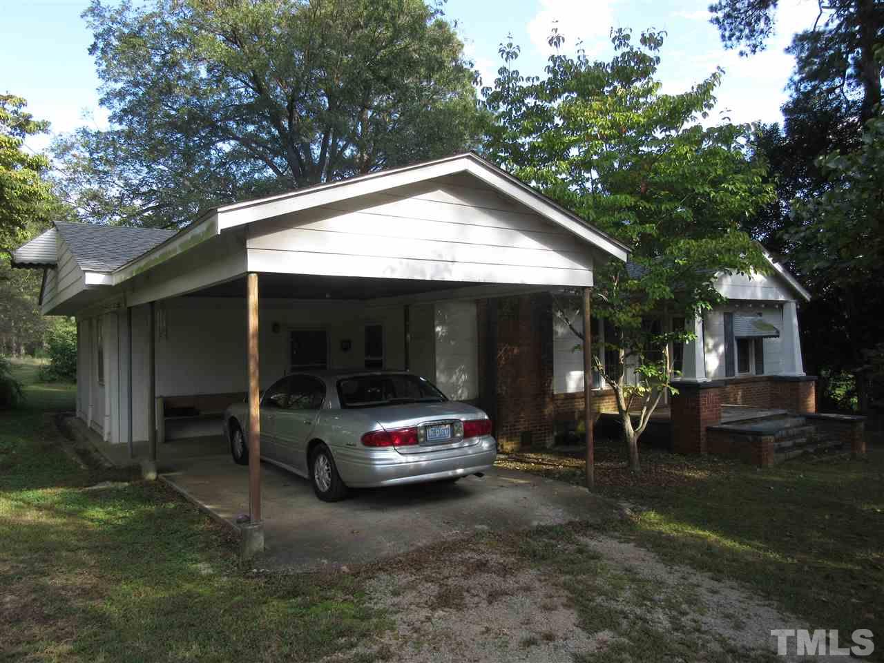 2281 Bryantown Road, Unit 68 49 ACRES Spring Hope, NC 27882 - Photo 11 of 21 a car parked in front of house