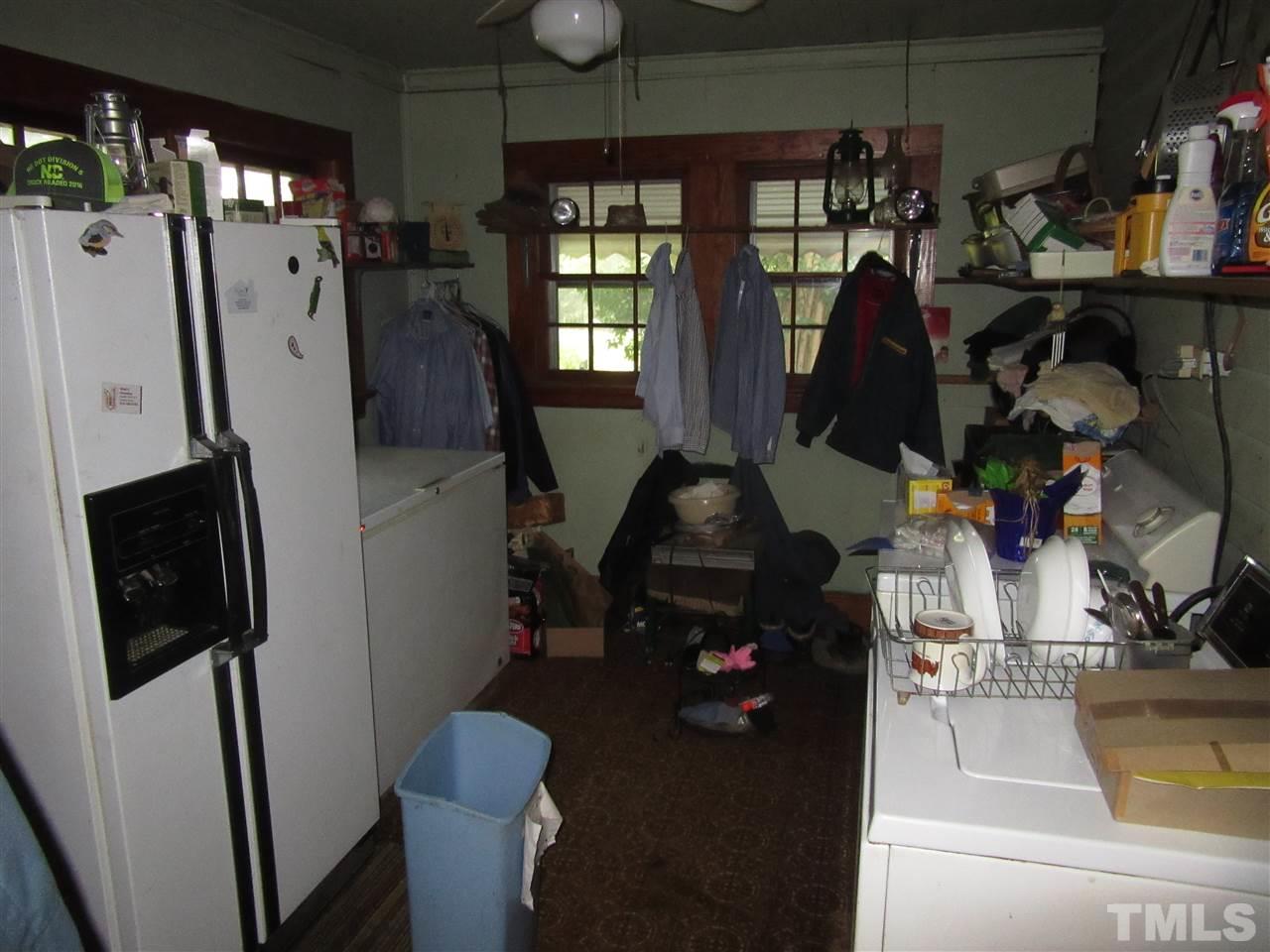 2281 Bryantown Road, Unit 68 49 ACRES Spring Hope, NC 27882 - Photo 20 of 21 a view of a entryway with storage and utility room