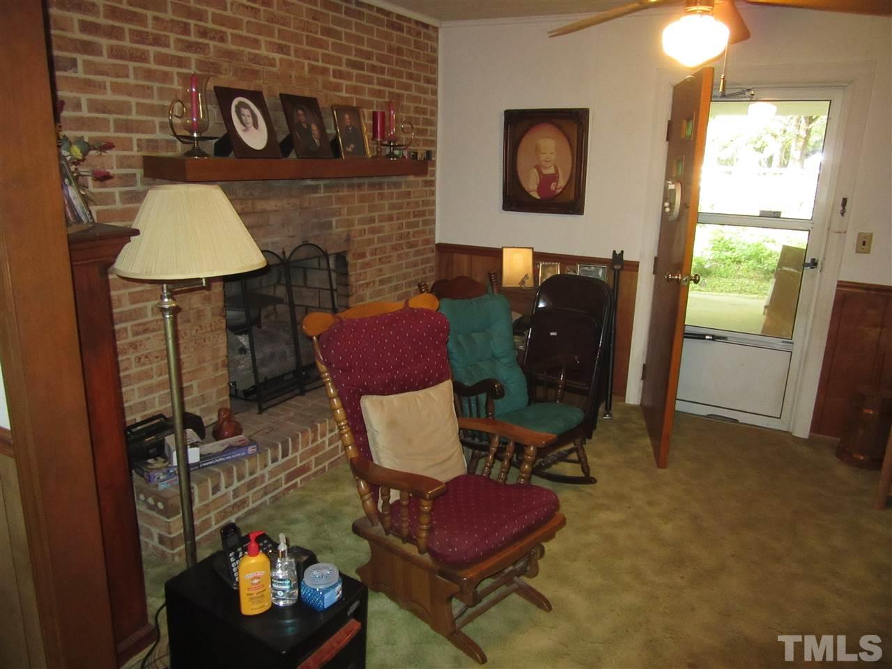 2281 Bryantown Road, Unit 68 49 ACRES Spring Hope, NC 27882 - Photo 21 of 21 a living room with furniture and a window