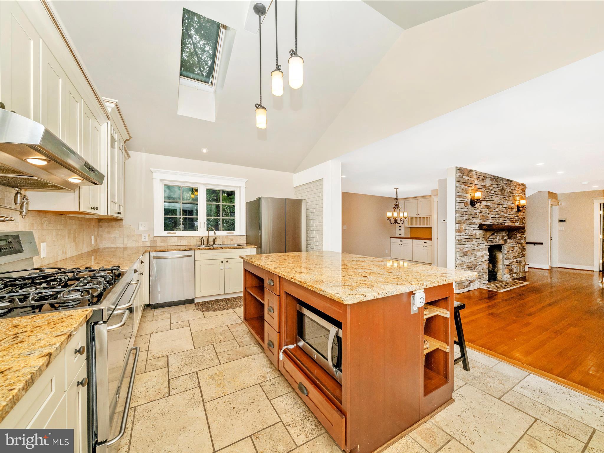 1925 Pagebrook Road Silver Spring, MD 20903 - Photo 18 of 74 a kitchen that has a lot of cabinets in it