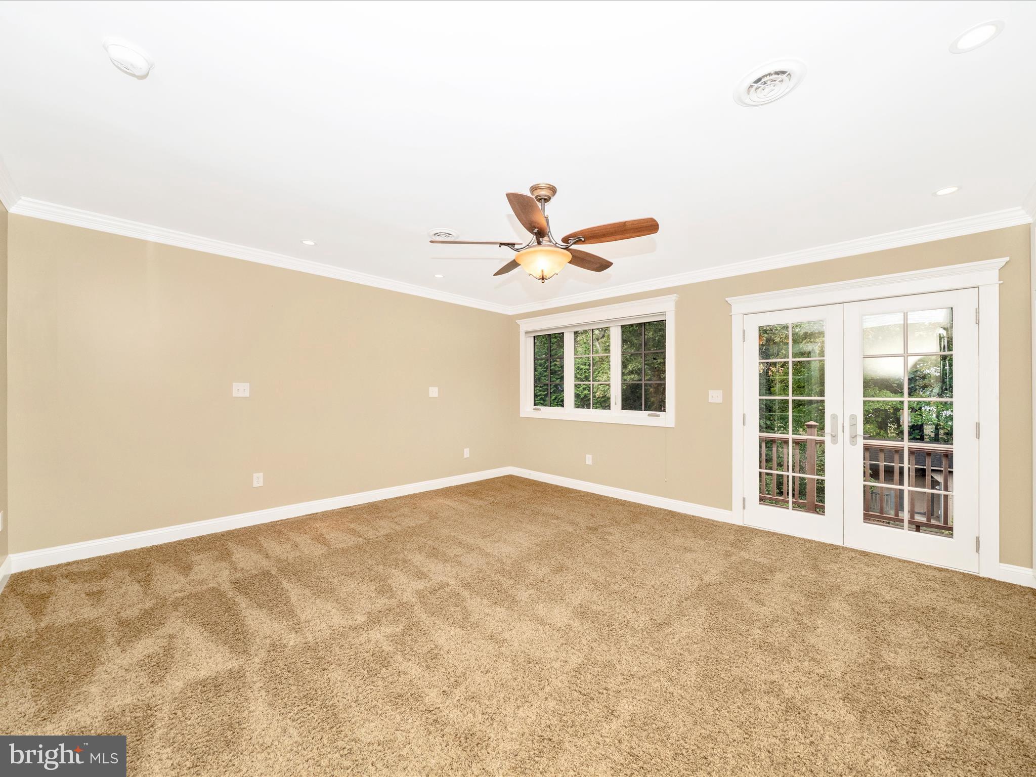 1925 Pagebrook Road Silver Spring, MD 20903 - Photo 33 of 74 an empty room with window and ceiling fan