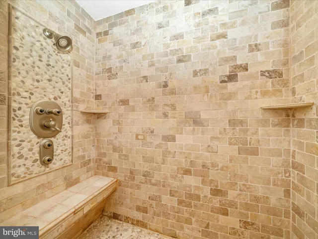 a view of a hallway view with wooden floor and dining room