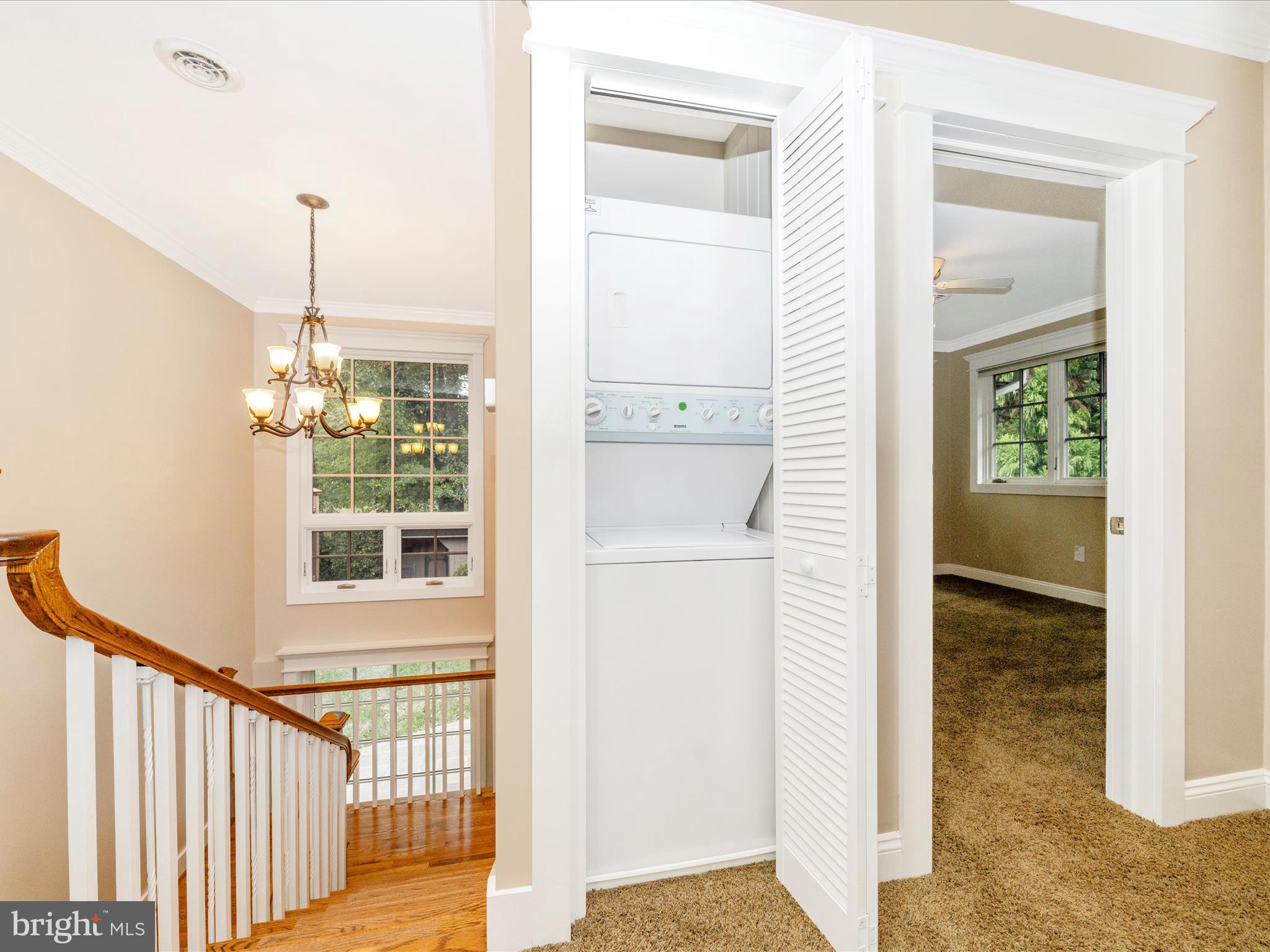 1925 Pagebrook Road Silver Spring, MD 20903 - Photo 42 of 74 a view of a hallway view with wooden floor and dining room