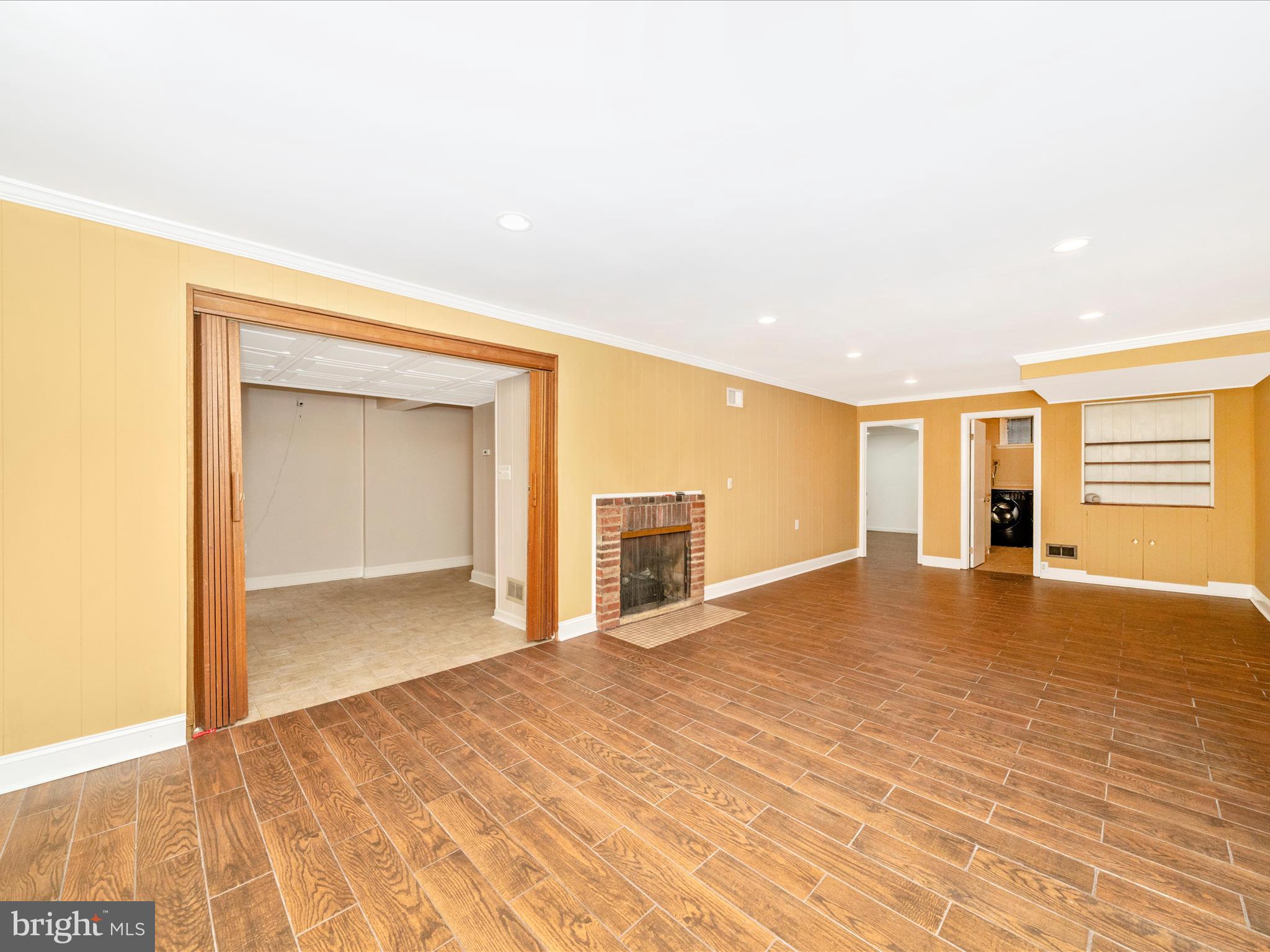 1925 Pagebrook Road Silver Spring, MD 20903 - Photo 44 of 74 a view of empty room with wooden floor and fan