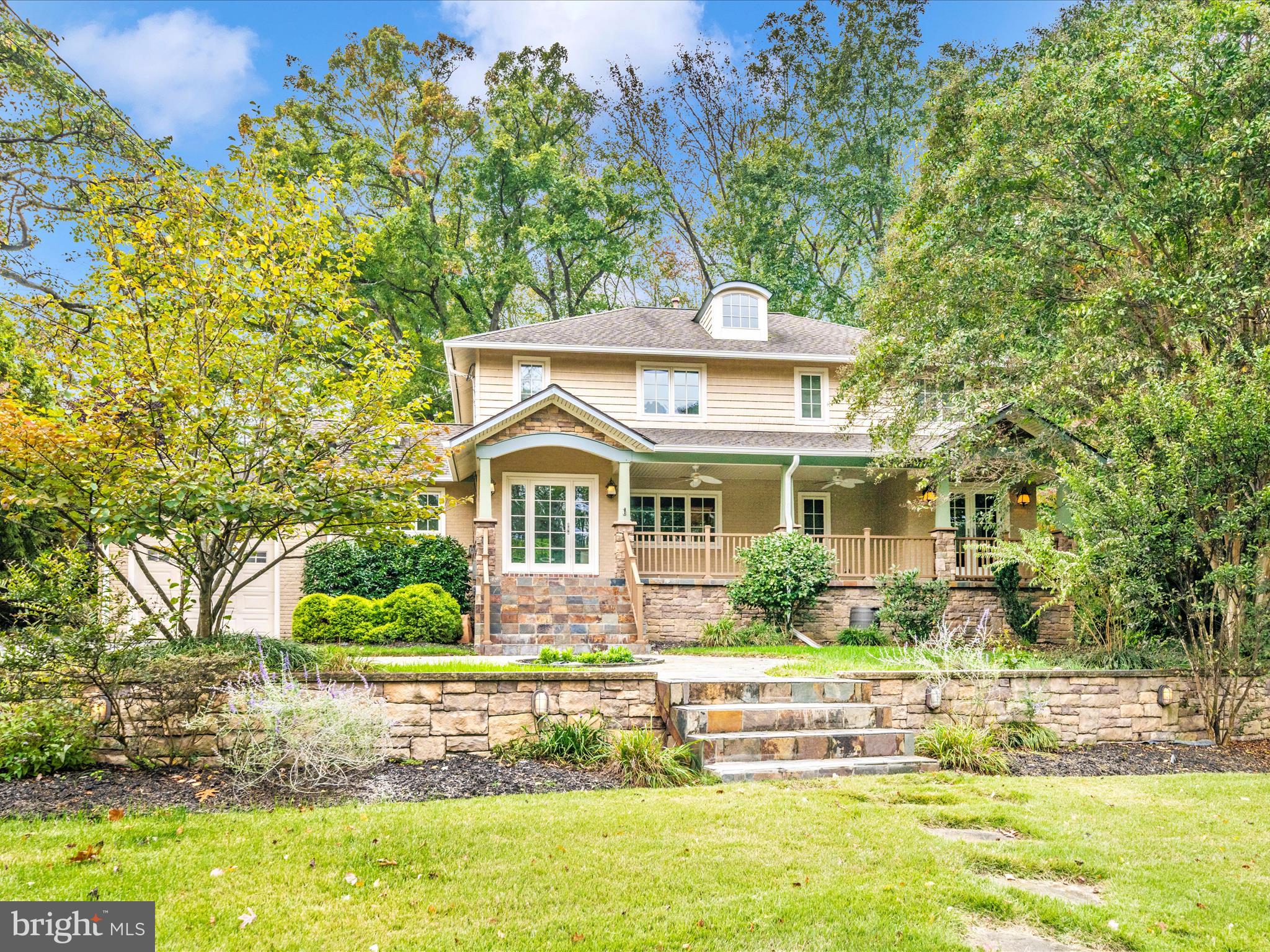 1925 Pagebrook Road Silver Spring, MD 20903 - Photo 61 of 74 a front view of a house with a garden