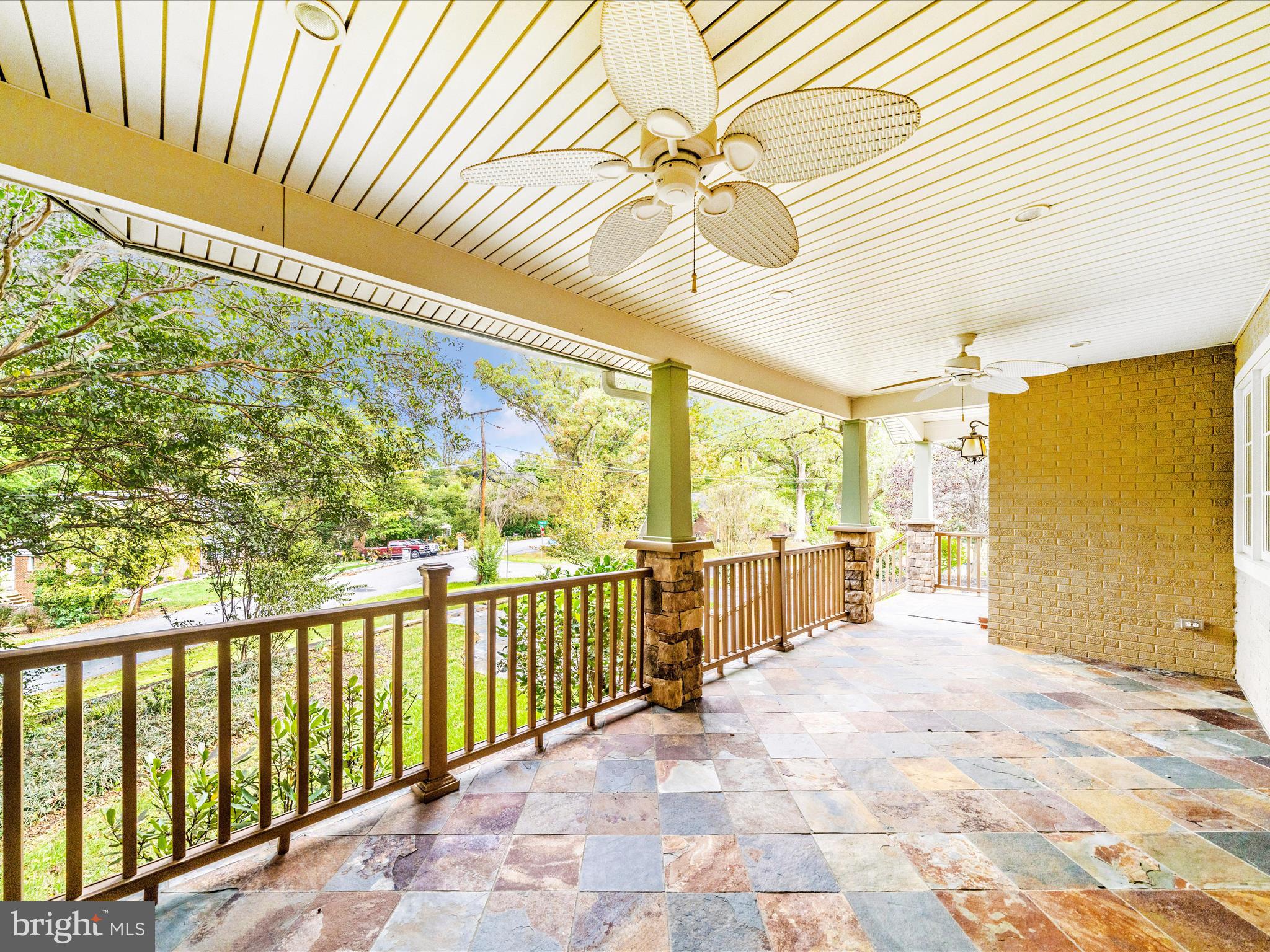 1925 Pagebrook Road Silver Spring, MD 20903 - Photo 65 of 74 a view of a porch with wooden floor and fence