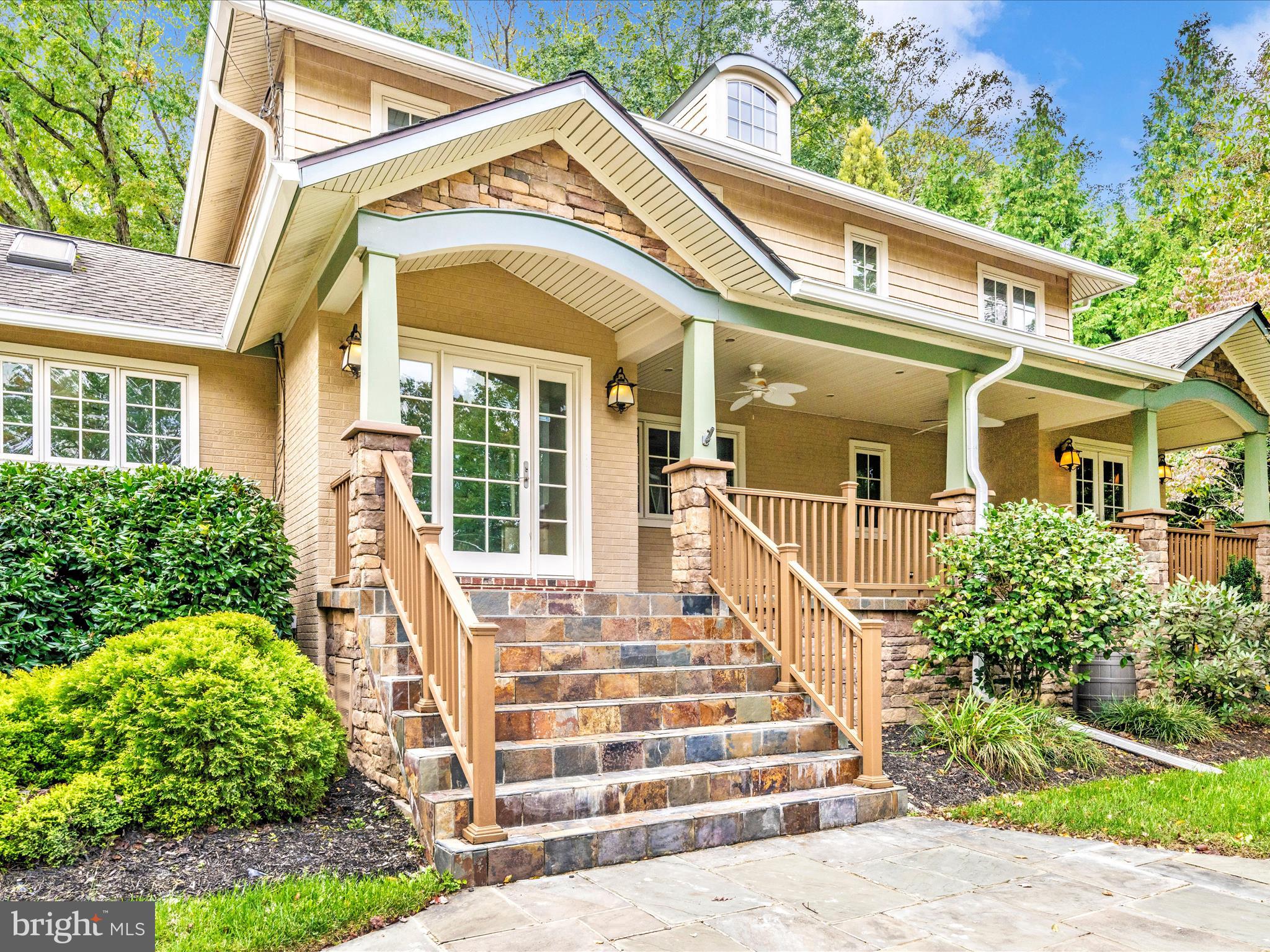1925 Pagebrook Road Silver Spring, MD 20903 - Photo 9 of 74 a front view of a house with a porch