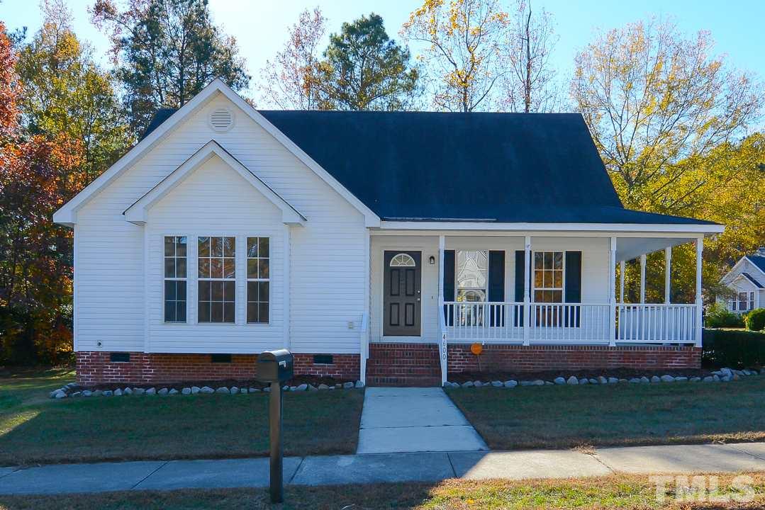 4600 Sinclair Drive Raleigh, NC 27616 - Photo 1 of 25 a front view of a house with a garden
