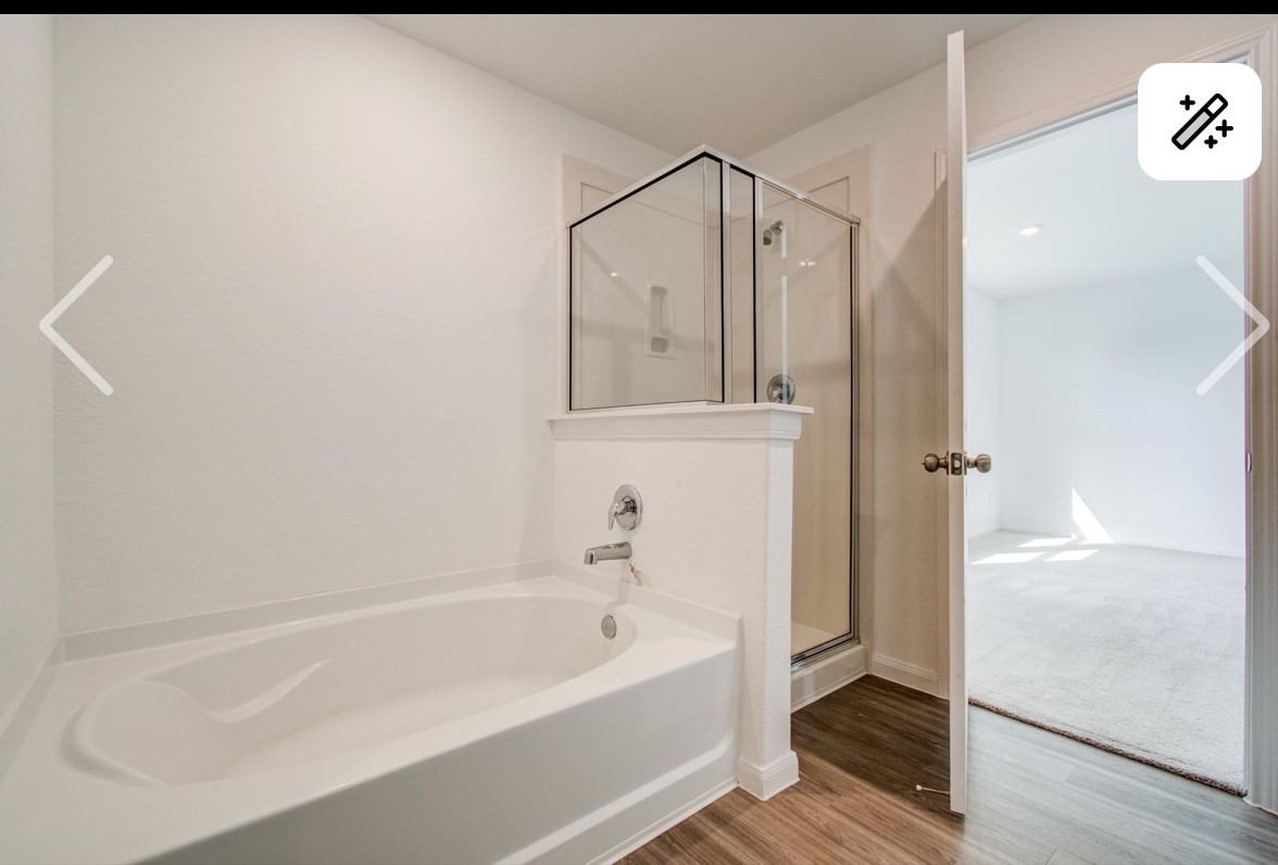 5522 Broad Spruce Street Spring, TX 77373 - Photo 19 of 21 a bathroom with a bathtub and a shower