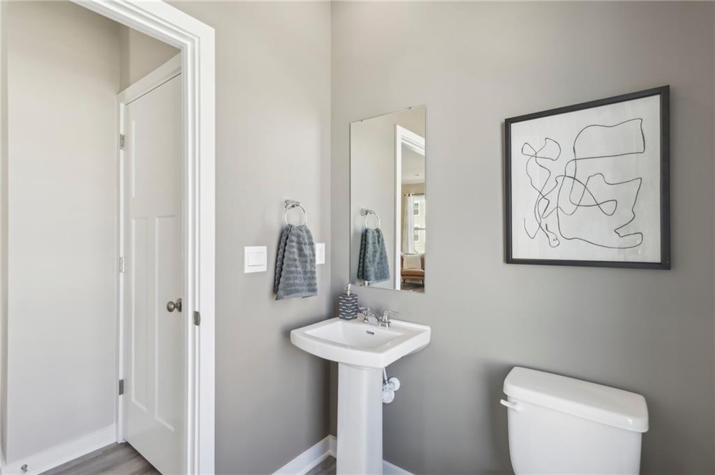 147 River Rdg Drive Moon Township, PA 15108 - Photo 12 of 23 a bathroom with a toilet a sink and mirror