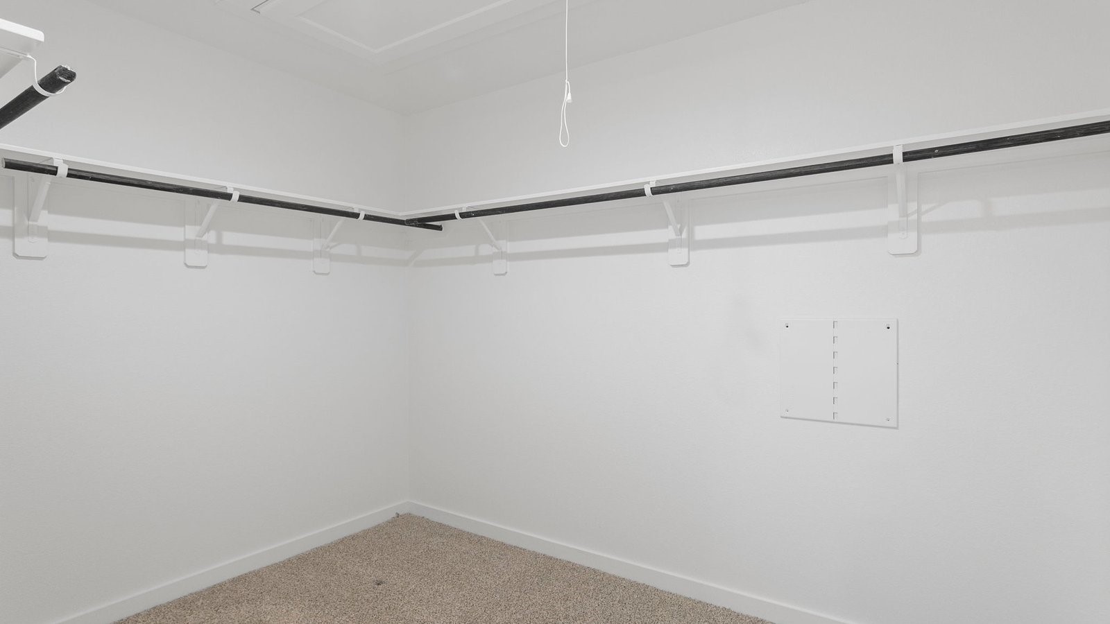 6203 Brookhaven Street Rosenberg, TX 77469 - Photo 18 of 38 a view of a room with racks on the wall