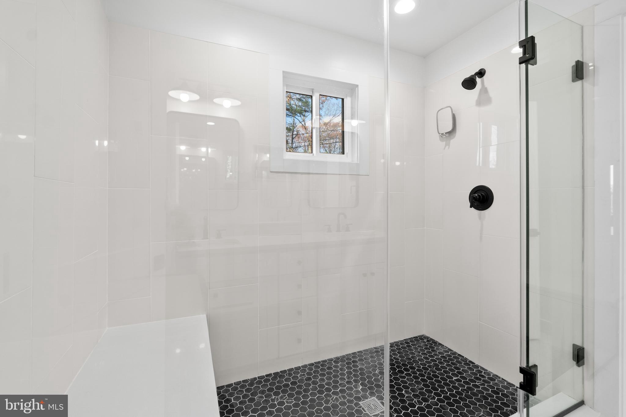 338 Somerset Road Pasadena, MD 21122 - Photo 35 of 70 Large tiled shower w/ bench