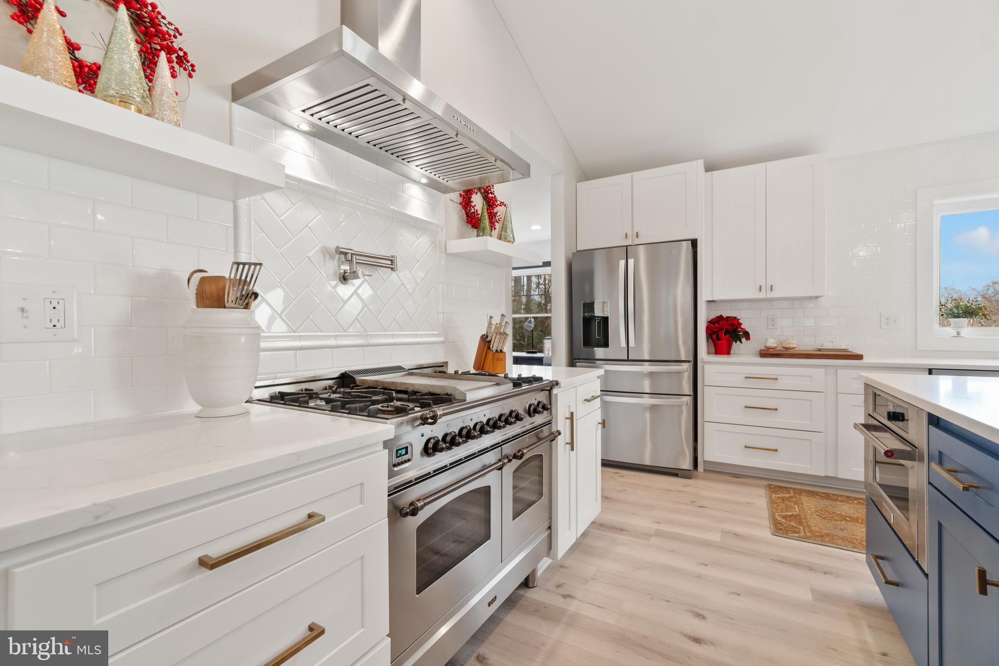 338 Somerset Road Pasadena, MD 21122 - Photo 9 of 70 ILVE gas range w/wall-mounted pot filler