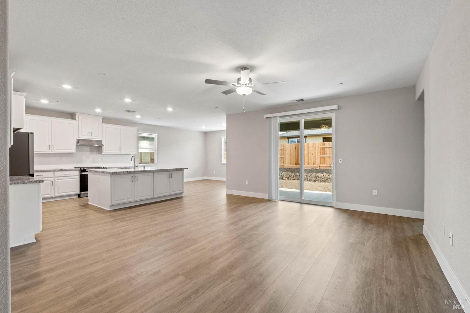 2139 Rustic Oak Lane Rio Vista, CA 94571 - Photo 3 of 24 a view of kitchen with cabinets and wooden floor