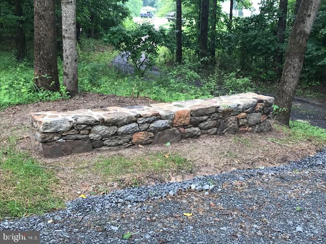 8050 Leeds Manor Road Marshall, VA 20115 - Photo 11 of 21 Decorative stone walls at driveway entrance