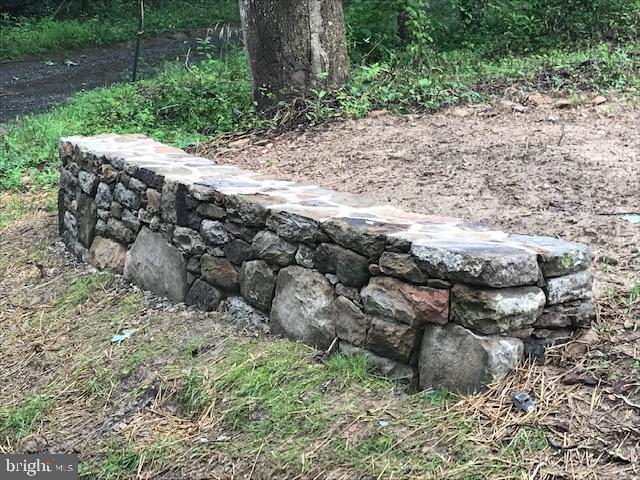 8050 Leeds Manor Road Marshall, VA 20115 - Photo 12 of 21 Decorative stone walls at driveway entrance
