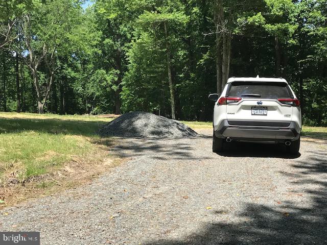 8050 Leeds Manor Road Marshall, VA 20115 - Photo 10 of 21 Car parked at driveway entrance