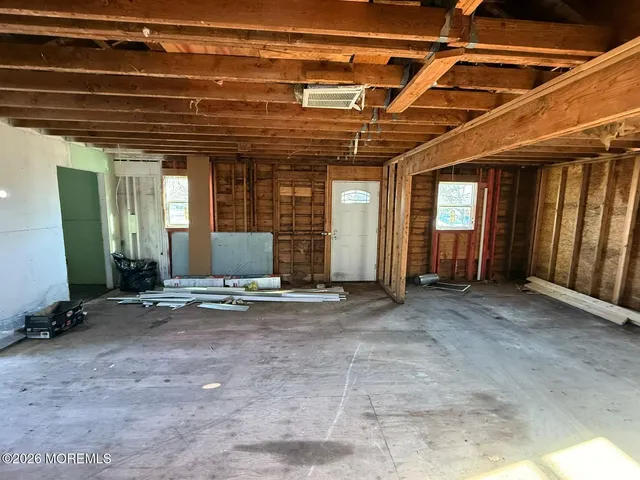 a view of a room with wooden walls