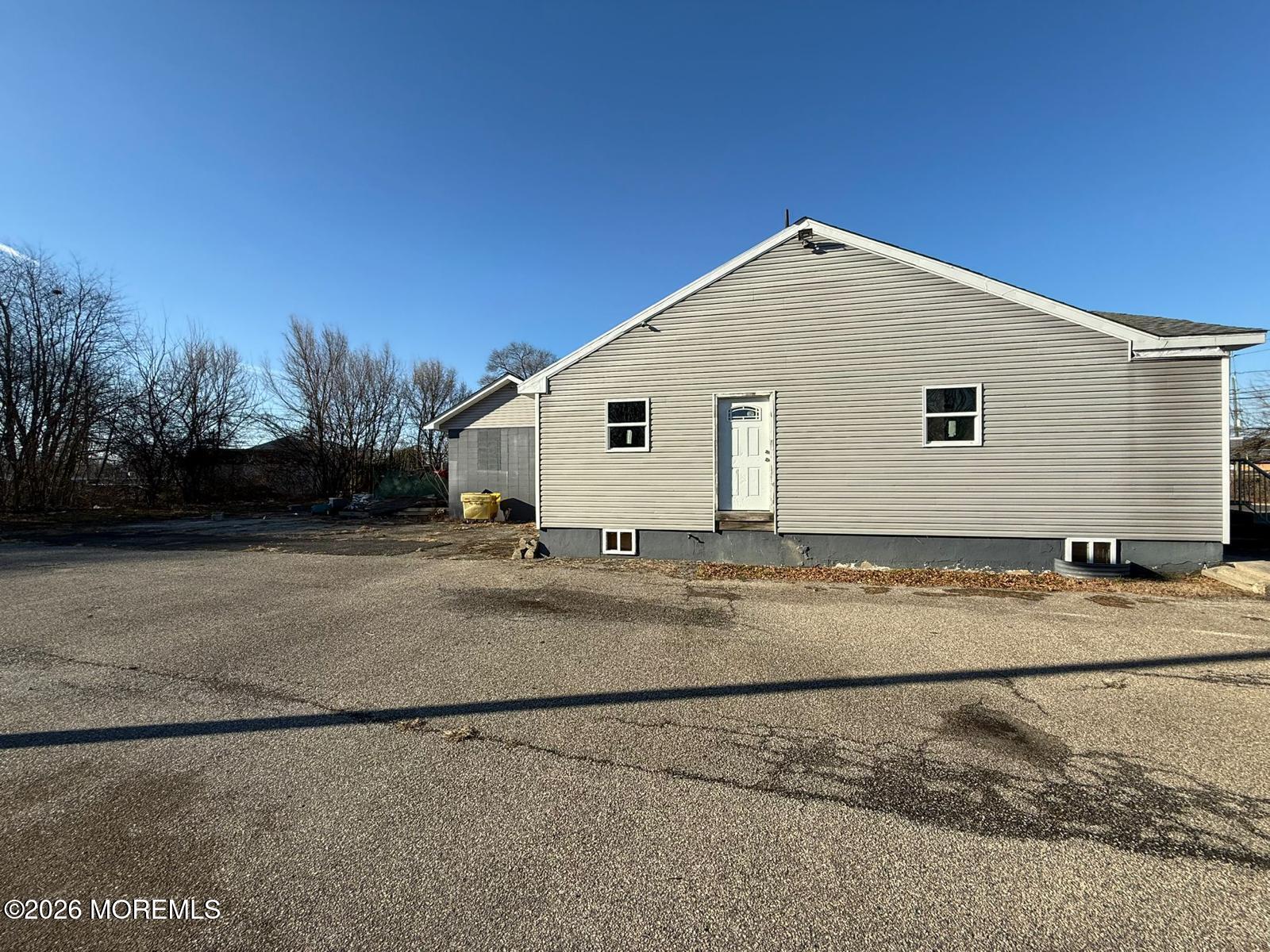 10 Sidney Lane Willingboro, NJ 08046 - Photo 7 of 7 a view of a house with a yard