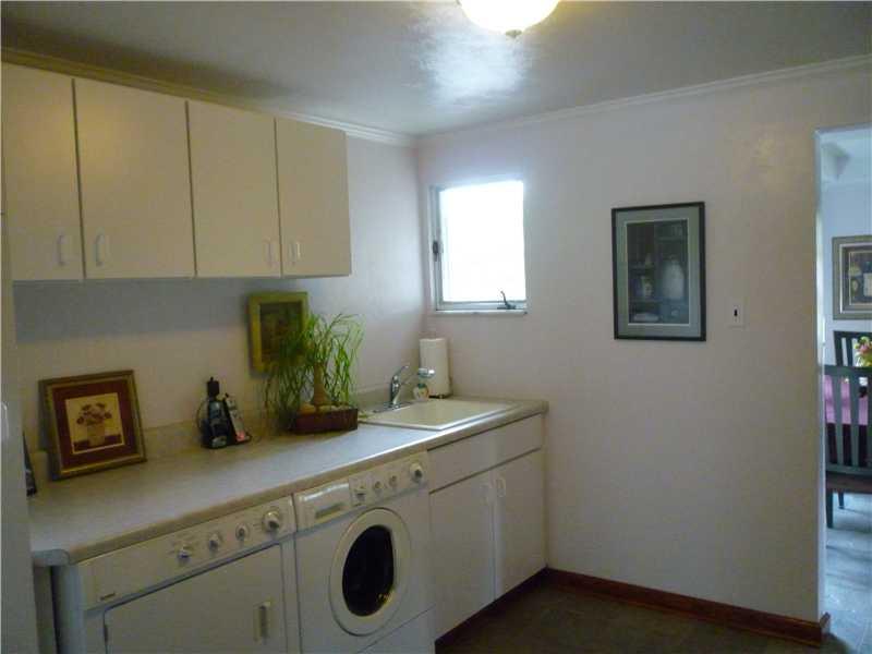 1357 Prospect Road Whitehall, PA 15227 - Photo 8 of 22 Other. THE LAUNDRY ROOM IS OFF THE KITCHEN WITH A SERVICE BAR.