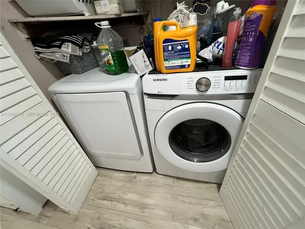a utility room with dryer and washer
