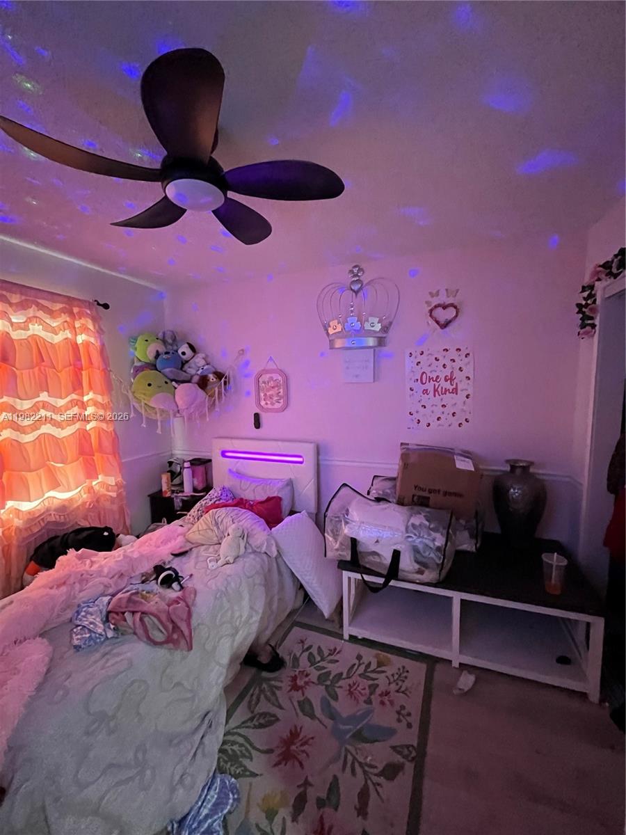 13485 Southwest 28th Street Miami, FL 33175 - Photo 22 of 33 a bedroom with pink walls and pink walls