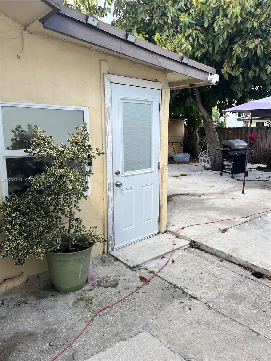 13485 Southwest 28th Street Miami, FL 33175 - Photo 27 of 33 a view of a backyard of the house