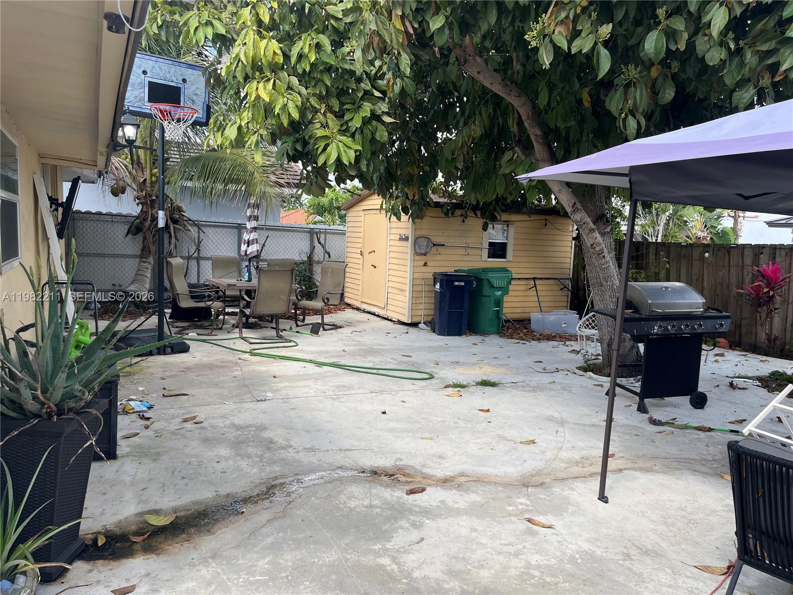 13485 Southwest 28th Street Miami, FL 33175 - Photo 29 of 33 an outdoor space with seating