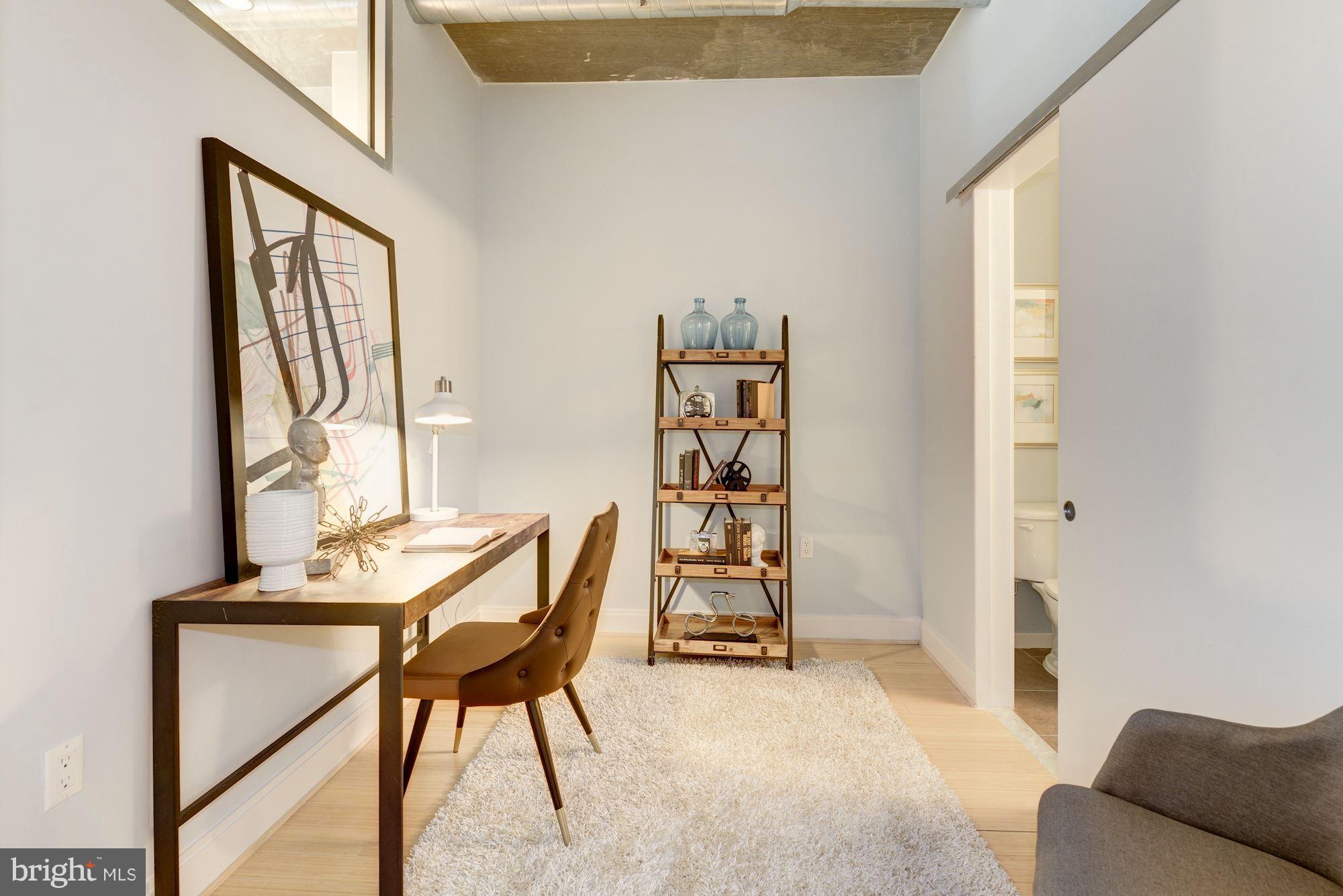 929 Florida Avenue Northwest, Unit 4002 Washington, DC 20001 - Photo 7 of 12 a view of a livingroom with furniture and a window