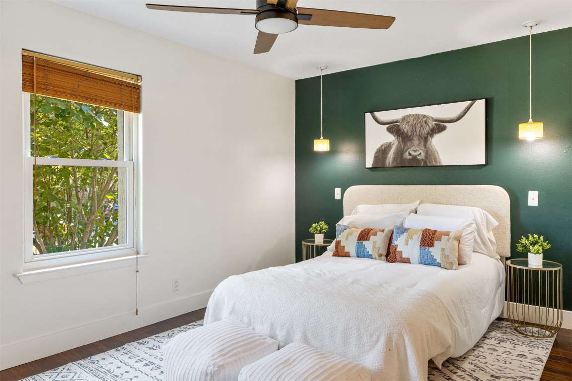 9228 Partridge Circle Austin, TX 78758 - Photo 20 of 36 a bedroom with a bed and window