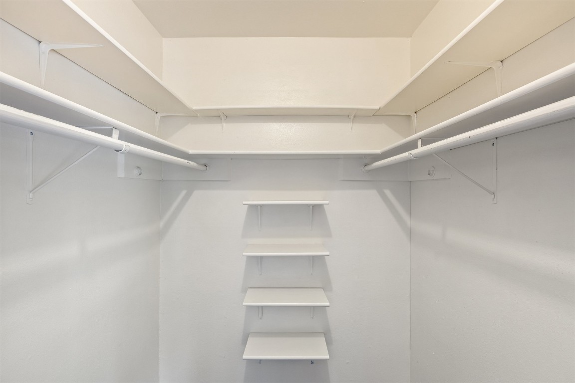 9228 Partridge Circle Austin, TX 78758 - Photo 24 of 36 a view of an empty walk in closet