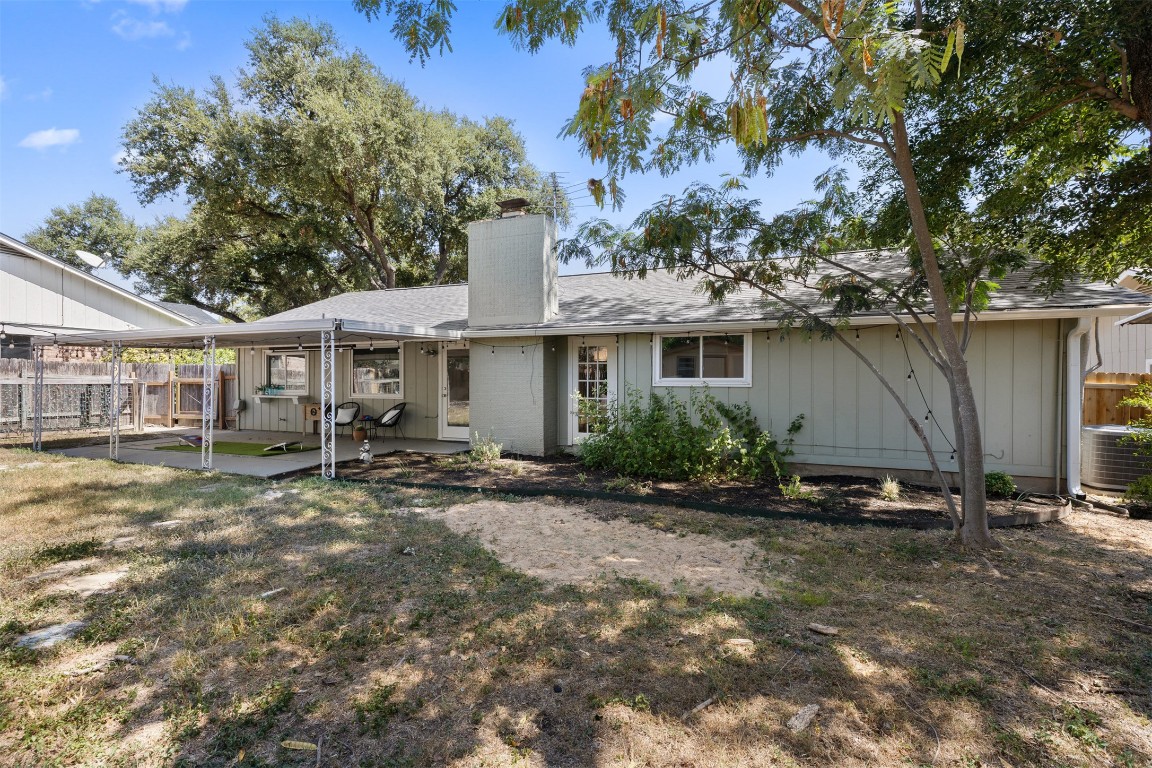 9228 Partridge Circle Austin, TX 78758 - Photo 33 of 36 a front view of a house with garden