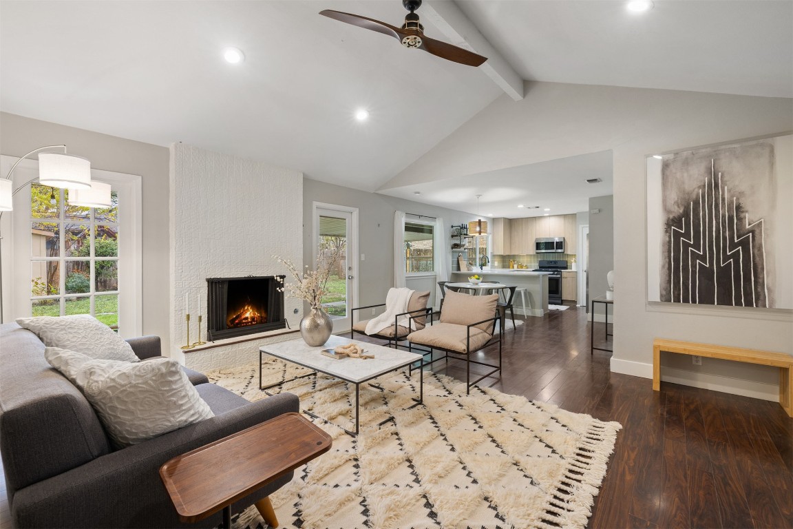 9228 Partridge Circle Austin, TX 78758 - Photo 4 of 36 a living room with furniture and a fireplace