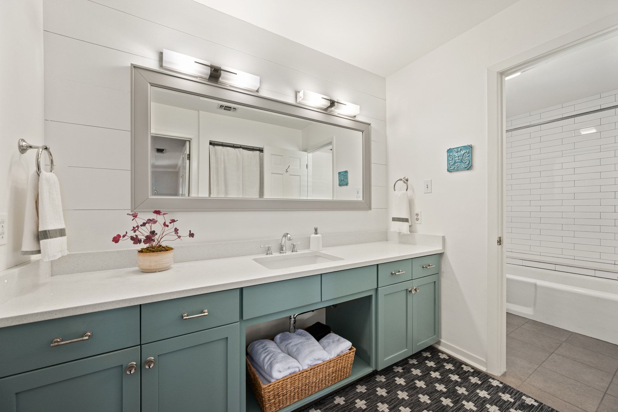 4503 Mountain Path Drive Austin, TX 78759 - Photo 19 of 36 Double vanity areas with quartz counters and updated tub surround.