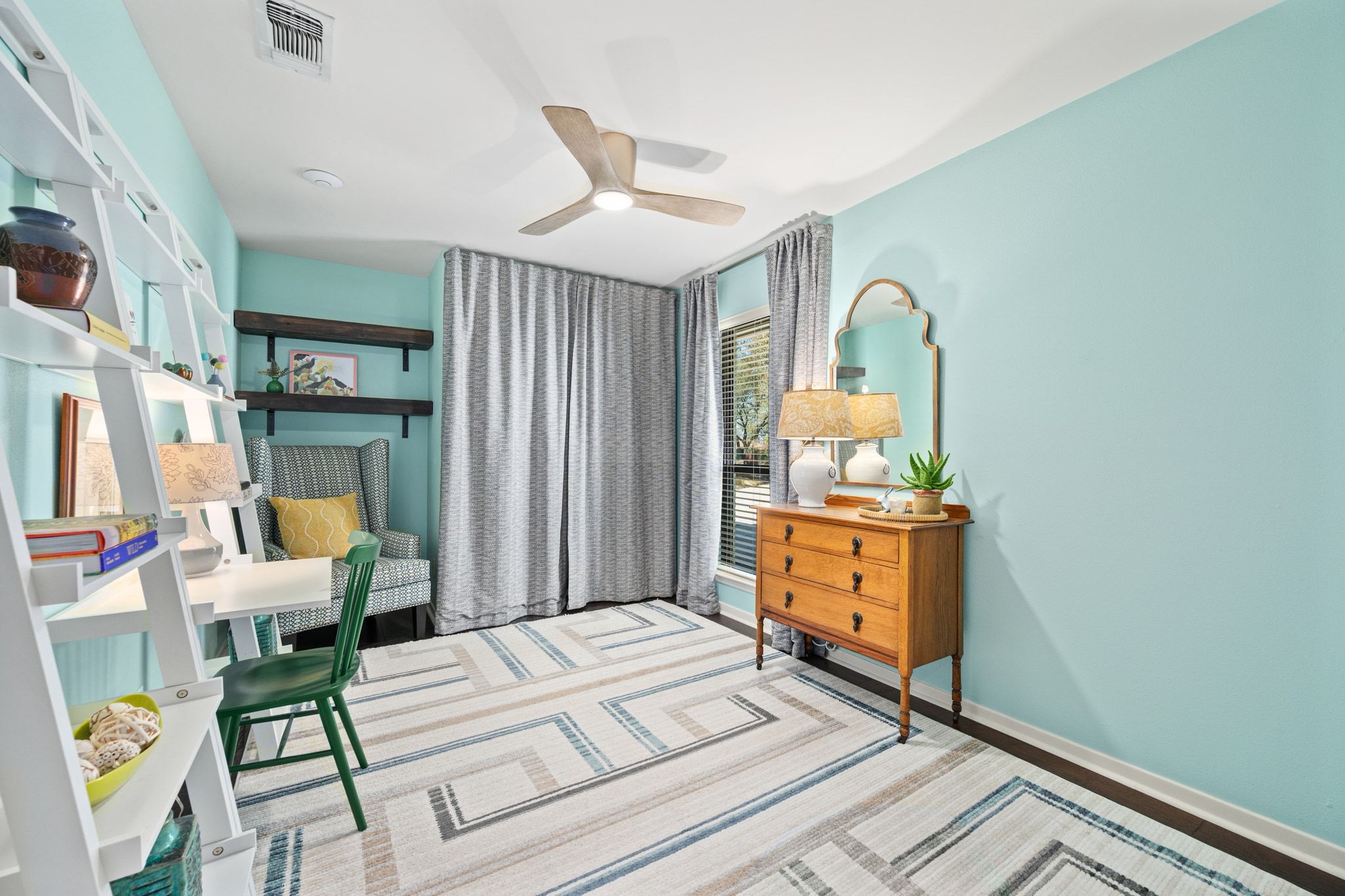 4503 Mountain Path Drive Austin, TX 78759 - Photo 23 of 36 Main level bedroom with Murphy bed tucked away.