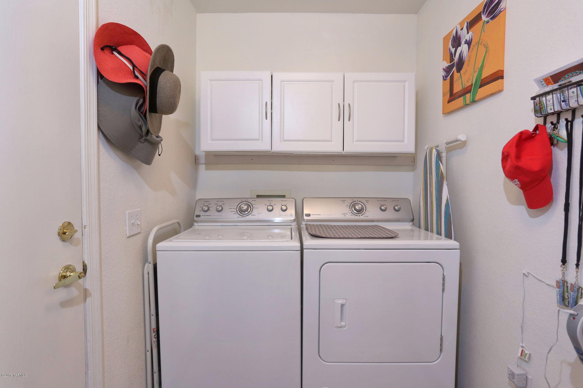 1065 East Royal Oak Road Oro Valley, AZ 85755 - Photo 16 of 19 a utility room with dryer and washer