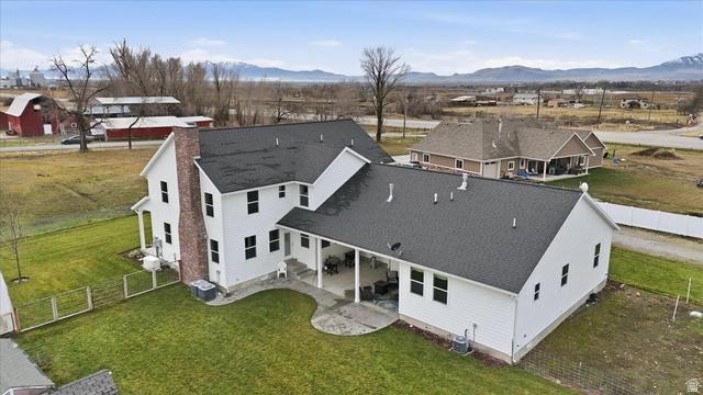 1009 High Creek Road Cove, UT 84320 - Photo 1 of 79 Drone / aerial view of a mountainous background