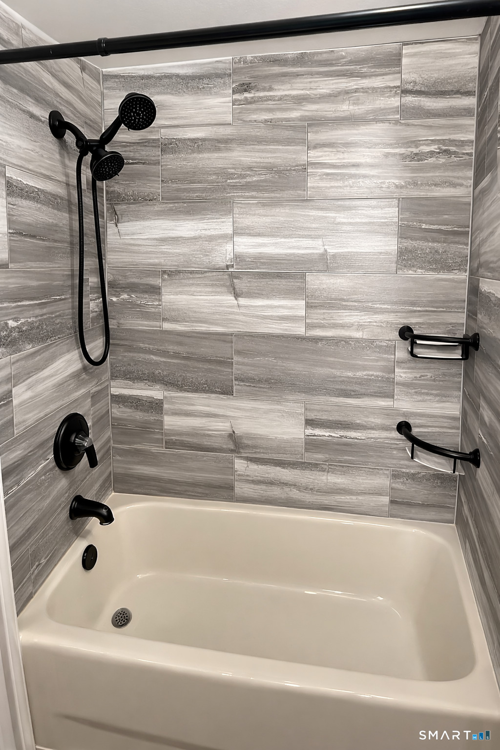 483 Charles Street Torrington, CT 06790 - Photo 16 of 40 a bathroom with a shower