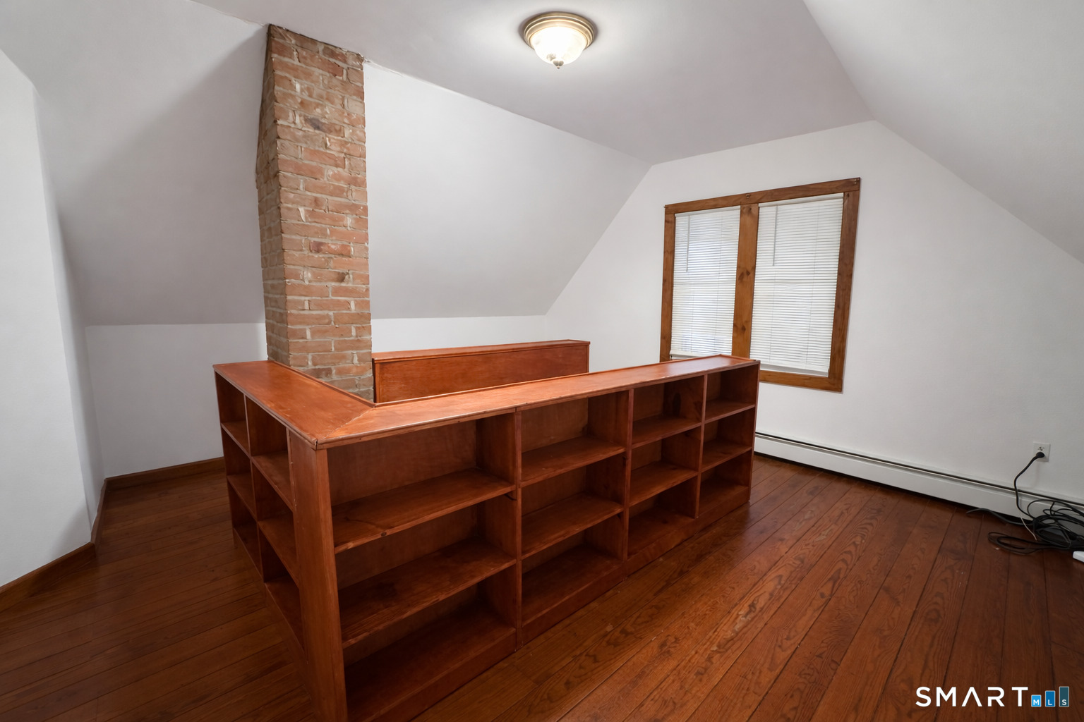 483 Charles Street Torrington, CT 06790 - Photo 17 of 40 a room with furniture and wooden floor