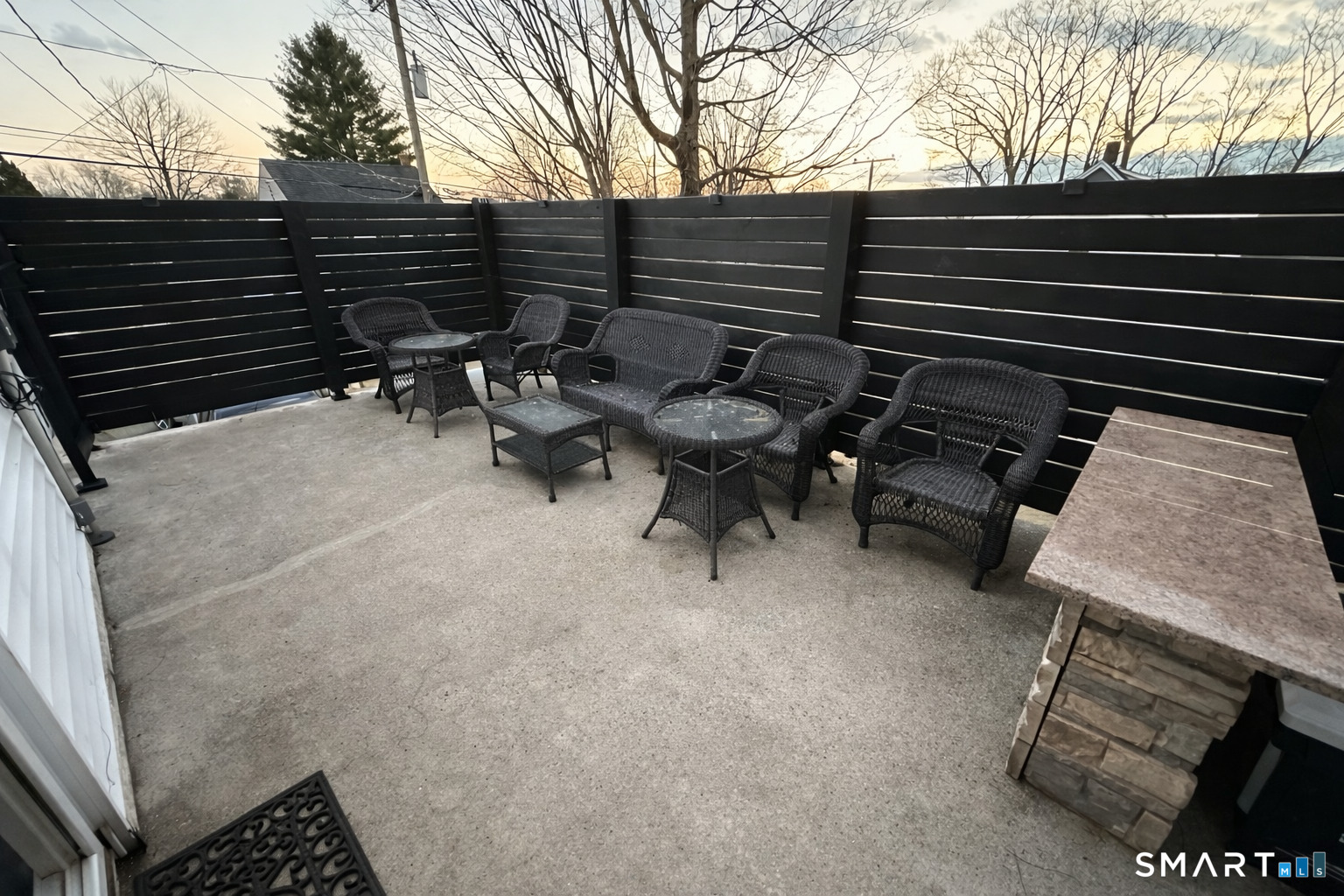 483 Charles Street Torrington, CT 06790 - Photo 30 of 40 a backyard of a house with table and chairs