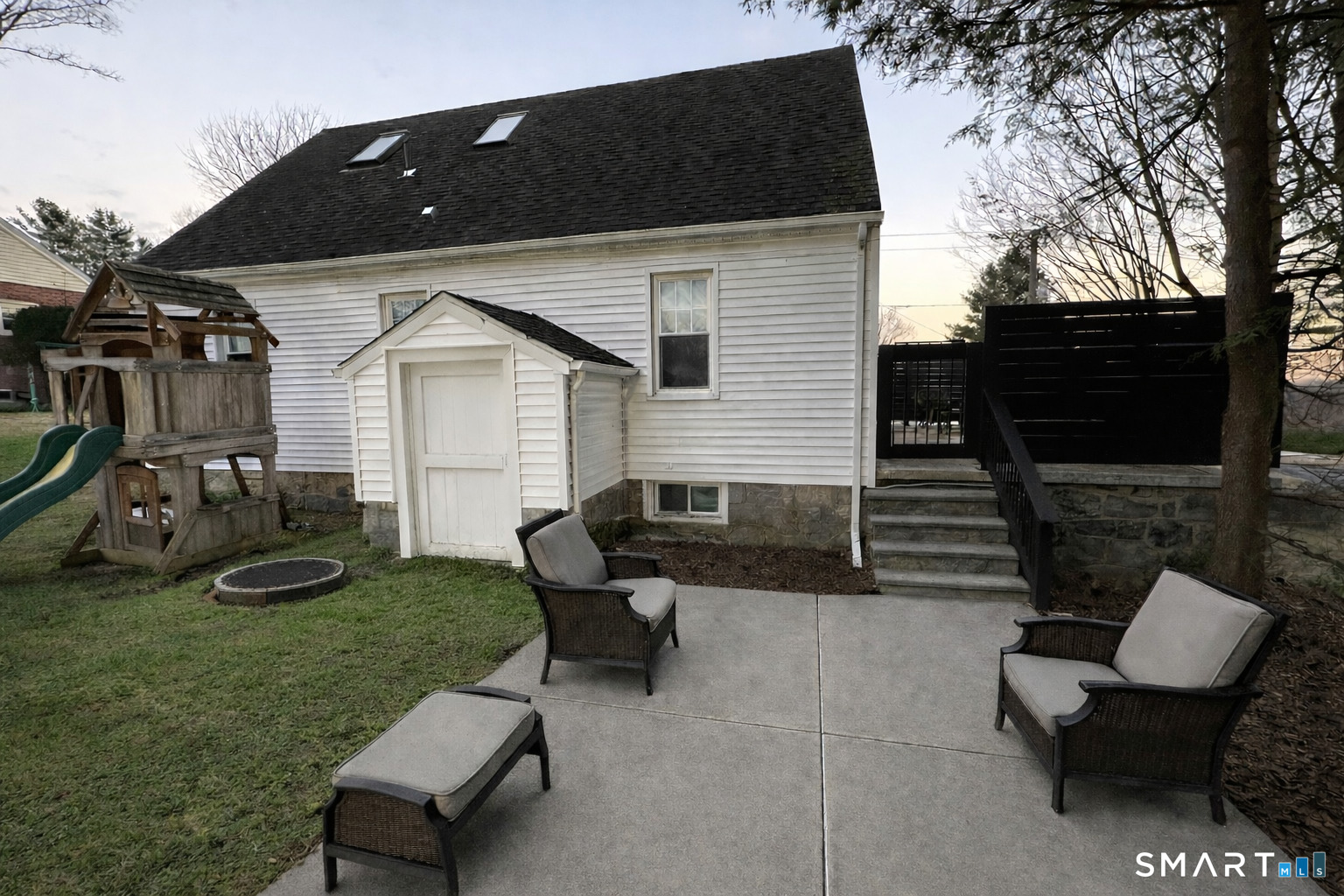 483 Charles Street Torrington, CT 06790 - Photo 33 of 40 a view of a house with backyard and sitting area