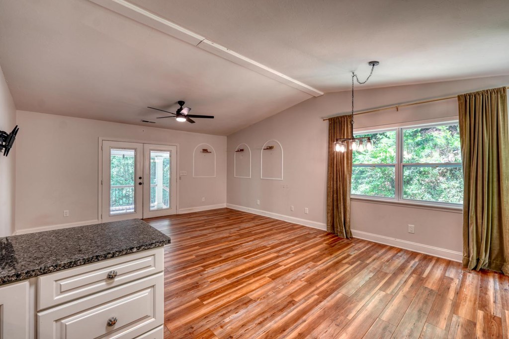 45 Mountain Stream Road Murphy, NC 28906 - Photo 2 of 33 a view of empty room with wooden floor and fan