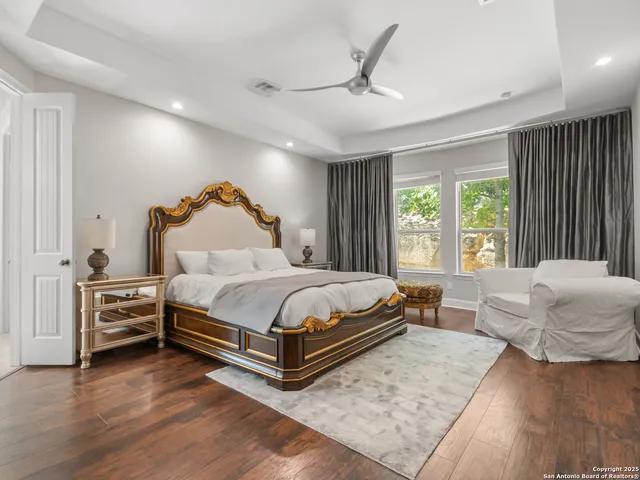 a bed room with a bed and a couch