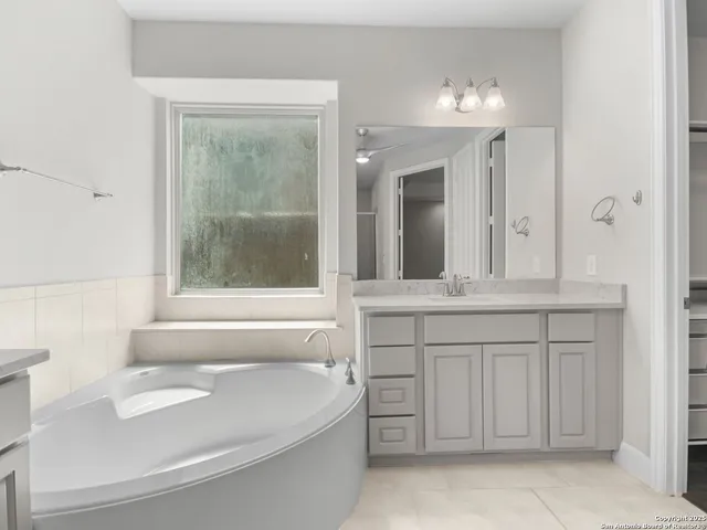 a bathroom with a sink and a bathtub